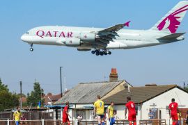 BEDFONT, ENGLAND - AUGUST 26: General view as a Qatar Airways aeroplane comes in to land at Heathrow Airport during the Cherry Red Records Combined Counties Football League Division One match between Bedfont & Feltham and AFC Hayes at The Orchard on August 26, 2019 in Bedfont, England. (Photo by Catherine Ivill/Getty Images)