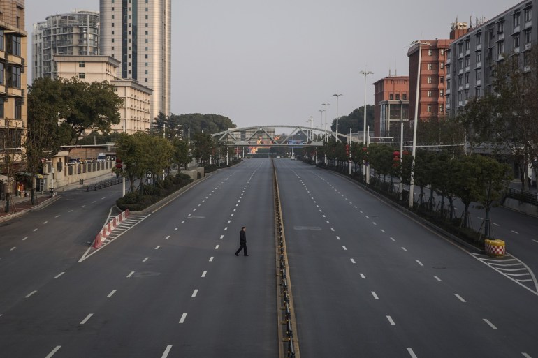 WUHAN, CHINA - FEBRUARY 03: (CHINA OUT) A man cross an empty highway road on February 3, 2020 in Wuhan, Hubei province, China. The number of those who have died from the Wuhan coronavirus, known as 2019-nCoV, in China climbed to 361 and cases have been reported in other countries including the United States, Canada, Australia, Japan, South Korea, India, the United Kingdom, Germany, France, and several others. (Photo by Getty Images)