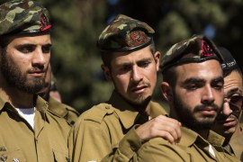 ASHKELON, ISRAEL - DECEMBER 14: Israeli soldiers mourn during the funeral of their comrade Yovel Mor Yosef on December 14, 2018 in Ashkelon, Israel. Yovel Mor Yosef was one of two members of the Israeli Defense Forces shot and killed on Thursday outside the Givat Assaf settlement outpost. (Photo by Amir Levy/Getty Images)