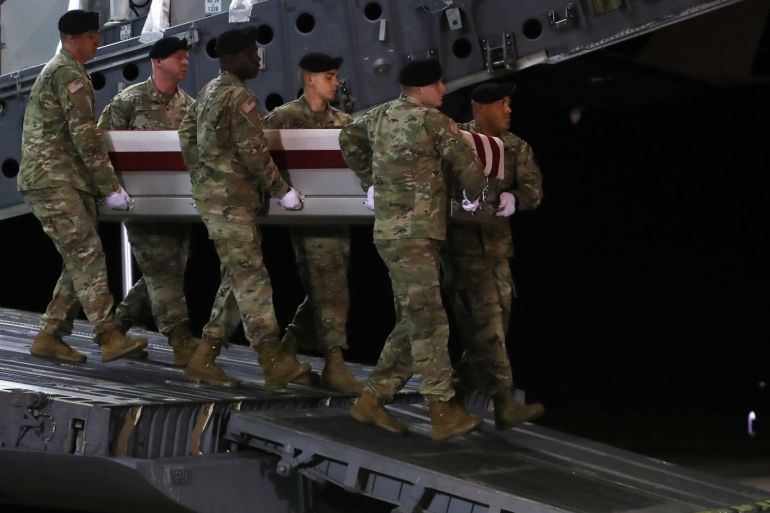 DOVER, DELAWARE - JULY 15: A U.S. Army carry team moves the transfer case containing the remains of U.S. Army Sgt. Maj. James G. Sartor during a dignified transfer at Dover Air Force Base, July 15, 2019 in Dover, Delaware. Sgt. Maj. Sartor, 40, from Teague, Texas was a Special Forces company sergeant major, died July 13th during combat operations in Faryab province, Afghanistan. Mark Wilson/Getty Images/AFP== FOR NEWSPAPERS, INTERNET, TELCOS & TELEVISION USE ONLY ==