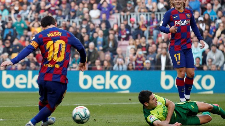 Soccer Football - La Liga Santander - FC Barcelona v Eibar - Camp Nou, Barcelona, Spain - February 22, 2020 Barcelona's Lionel Messi scores their third goal to complete his hat-trick REUTERS/Albert Gea