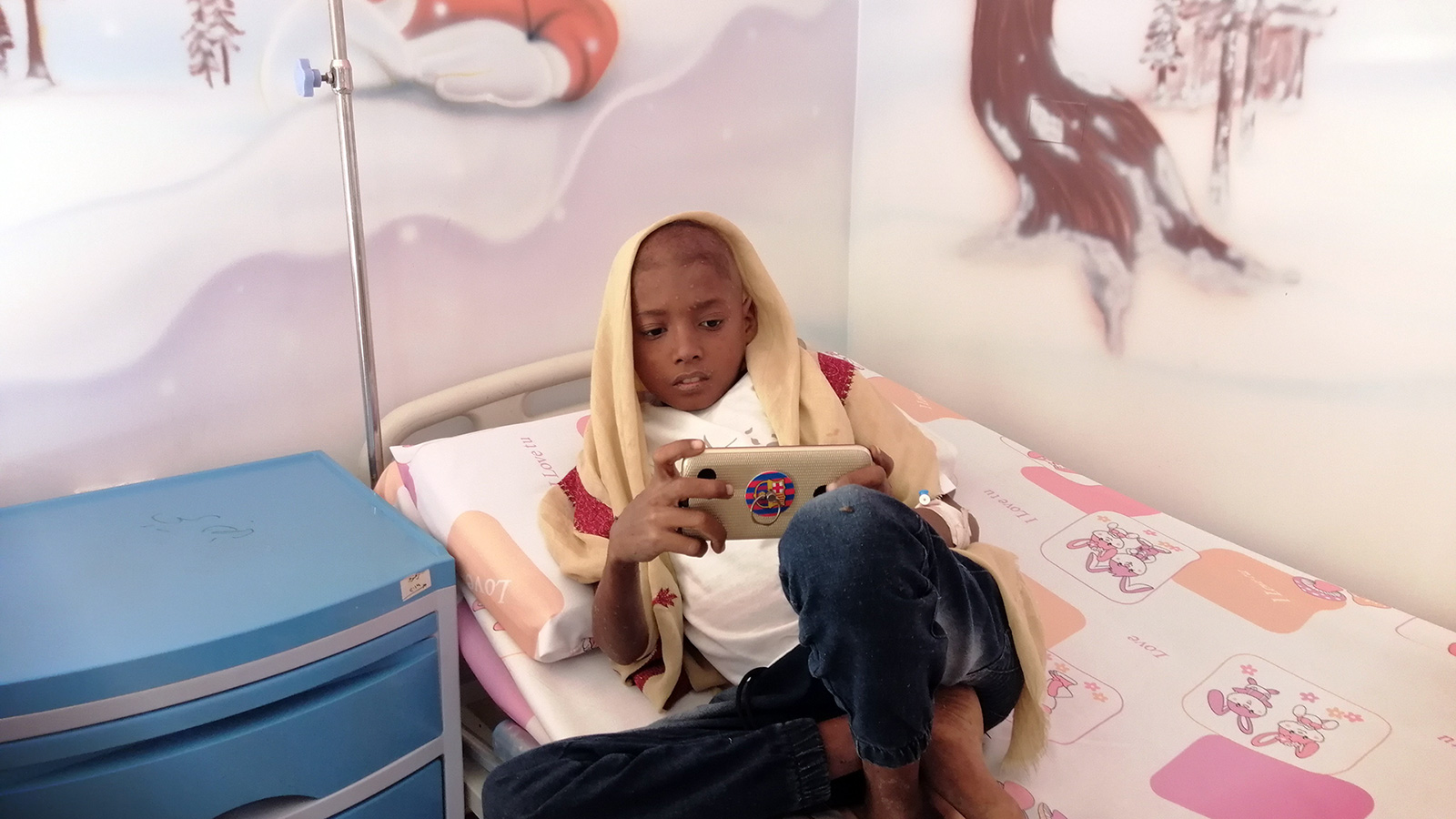 ‪طفل مصاب بمرض السرطان‬ (الجزيرة)