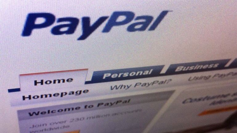 A page from the PayPal website is seen in Singapore July 21, 2011. EBay Inc's PayPal business has become one of the largest online payment systems, but its now heading offline, Chief Executive John Donahoe said in the wake of the e-commerce company's quarterly results on Wednesday. During 2012, PayPal will roll out in-store payment services with up to 20 national retailers, Donahoe predicted, without identifying the companies. REUTERS/Tan Shung Sin (SINGAPORE - Tags: SCI TECH BUSINESS)