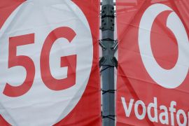 Logos of 5G technology and telecommunications company Vodafone are pictured at the 5G Mobility Lab of Vodafone in Aldenhoven, Germany, November 27, 2018. Picture taken November 27, 2018. REUTERS/Thilo Schmuelgen