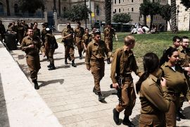JERUSALEM, ISRAEL - MAY 09: Young military recruits walk outside of the Old City on May 9, 2018 in Jerusalem, Israel. In a controversial move, the Trump administration in December announced it would move the U.S. embassy in Israel from Tel Aviv to Jerusalem on May 14. Jerusalem's Israeli-annexed eastern sector has been long sought for a future Palestinian capital and the move is viewed by Palestinians as a U.S. breach of long-standing promises to help negotiate a fair arrangement for the contested city. (Photo by Spencer Platt/Getty Images)