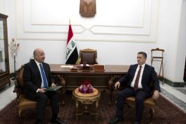 Iraq's President Barham Salih meets with new prime minister-designate Adnan al-Zurfi in Baghdad, Iraq March 17, 2020. The Presidency of the Republic of Iraq Office/Handout via REUTERS ATTENTION EDITORS - THIS IMAGE WAS PROVIDED BY A THIRD PARTY.