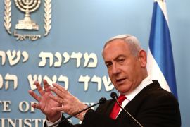 Israeli Prime Minister Benjamin Netanyahu gestures as he delivers a speech at his Jerusalem office, regarding the new measures that will be taken to fight the coronavirus, March 14, 2020. Gali Tibbon/Pool via REUTERS