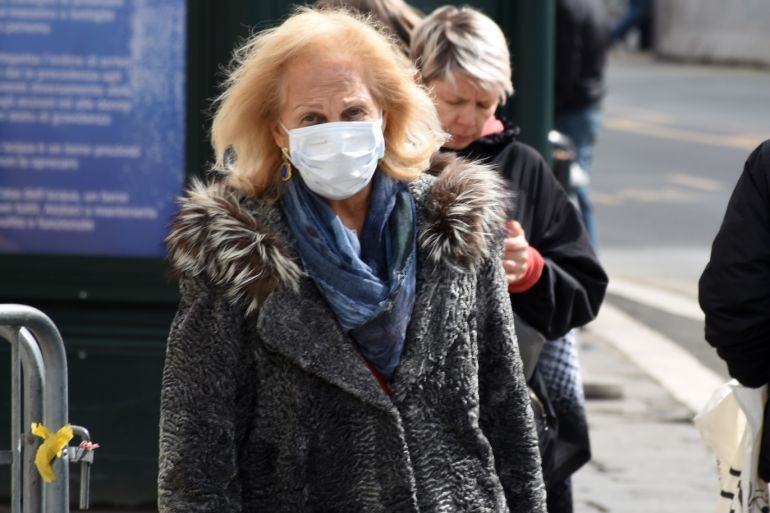 Coronavirus in Italy- - ROME, ITALY - MARCH 6: People wear face masks as a precaution not to being exposed to the coronavirus in Rone, Italy on March 6, 2020. The novel coronavirus, officially known as COVID-19, infected more than 97,000 people across the world, according to a data collecting website