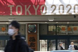 The banner for the 2020 Tokyo Olympics is displayed in front of Fukushima station in Fukushima, Japan, March 24, 2020, in this photo taken by Kyodo. Mandatory credit Kyodo/via REUTERS ATTENTION EDITORS - THIS IMAGE WAS PROVIDED BY A THIRD PARTY. MANDATORY CREDIT. JAPAN OUT. NO COMMERCIAL OR EDITORIAL SALES IN JAPAN.