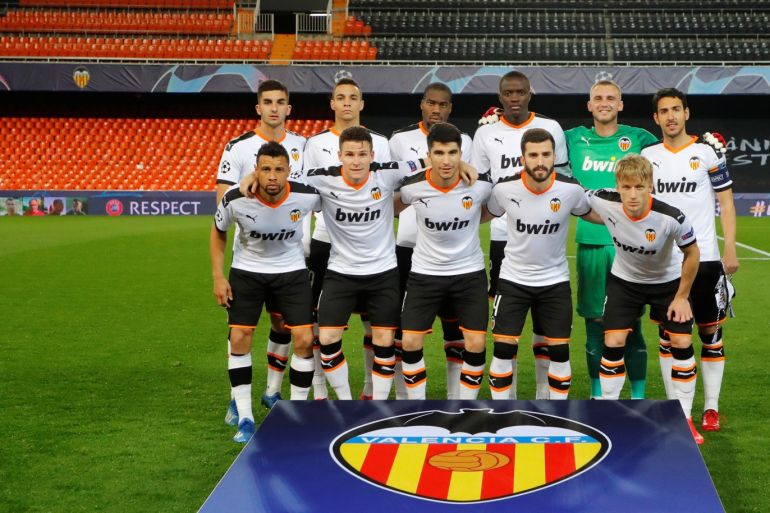 Soccer Football - Champions League - Round of 16 Second Leg - Valencia v Atalanta - Mestalla, Valencia, Spain - March 10, 2020 Valencia players pose for a team group photo before the match Lazaro Dela Pena for UEFA/Handout via REUTERS ATTENTION EDITORS - THIS IMAGE HAS BEEN SUPPLIED BY A THIRD PARTY.