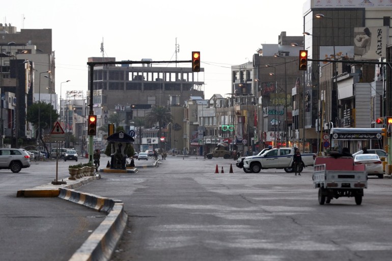 Coronavirus precautions in Iraq- - BAGHDAD, IRAQ - MARCH 21: Nearly empty roads are seen after the government declared curfew in Baghdad as a preventative measures against coronavirus (COVID-19) pandemic in Bagdad, Iraq on March 21, 2020.