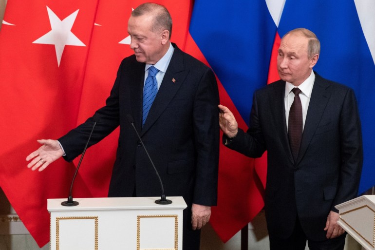 Russian President Vladimir Putin and Turkish President Tayyip Erdogan leave a news conference following their talks in Moscow, Russia March 5, 2020. Pavel Golovkin/Pool via REUTERS