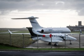 DOUGLAS, ISLE OF MAN - NOVEMBER 09: Jets are parked outside The Private Jet Company building at Ronaldsway Airport on November 9, 2017 near Douglas, Isle of Man. The Isle of Man is a low-tax British Crown Dependency with a population of just 85 thousand in the Irish Sea off the west coast England. Recent revelations in the Paradise Papers have linked the island to tax loopholes being used by Apple and Nike, as well as celebrities such as Formula One champion Lewis Ham