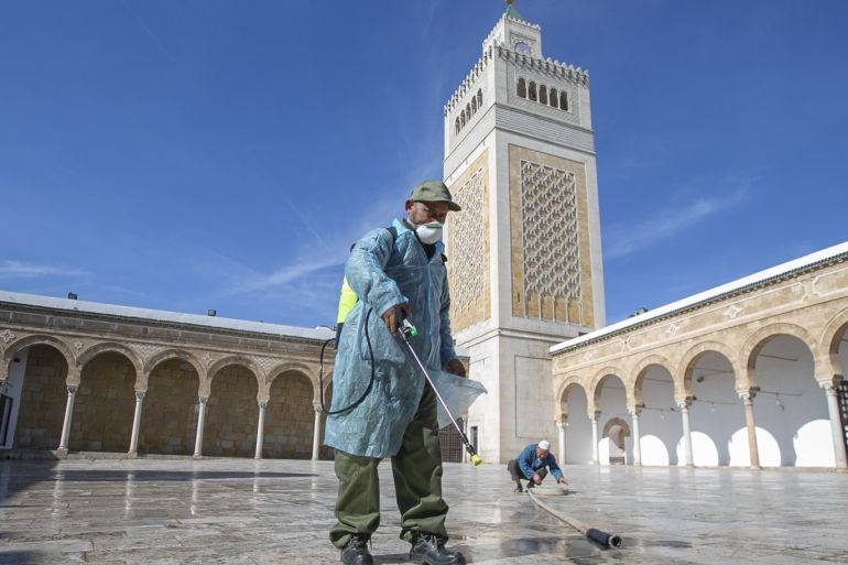 Coronavirus precautions in Tunisia- - TUNIS, TUNISIA - MARCH 13: Officials carry out disinfection works as a precaution against the coronavirus (COVID-19) at Al-Zaytuna Mosque in Tunis, Tunisia on March 13, 2020.