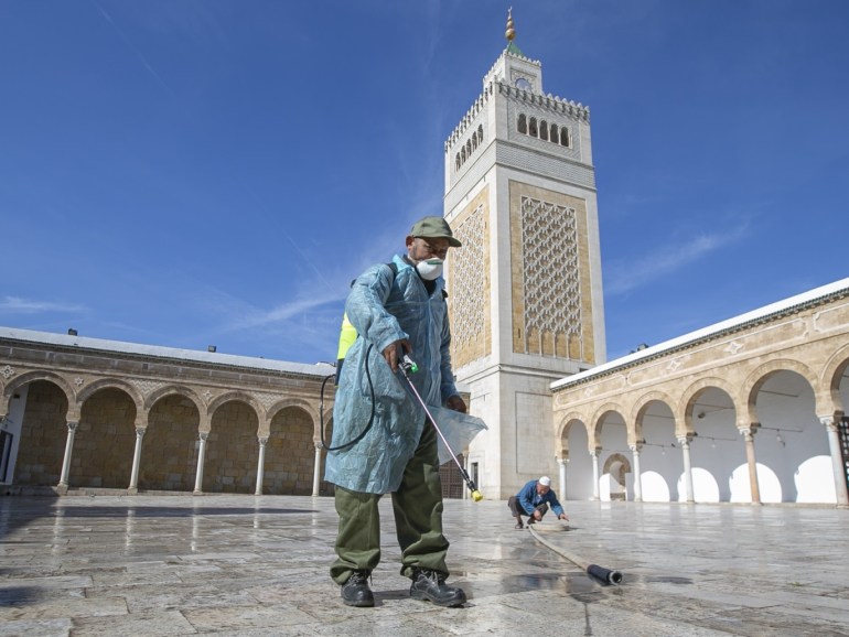 Coronavirus precautions in Tunisia- - TUNIS, TUNISIA - MARCH 13: Officials carry out disinfection works as a precaution against the coronavirus (COVID-19) at Al-Zaytuna Mosque in Tunis, Tunisia on March 13, 2020.