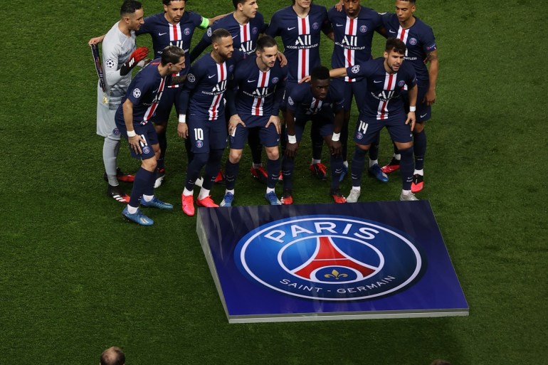 PARIS, FRANCE - MARCH 11: (FREE FOR EDITORIAL USE) In this handout image provided by UEFA, The PSG team pose for a team photo in front of two photographers prior to the UEFA Champions League round of 16 second leg match between Paris Saint-Germain and Borussia Dortmund at Parc des Princes on March 11, 2020 in Paris, France. The match is played behind closed doors as a precaution against the spread of COVID-19 (Coronavirus). (Photo by UEFA - Handout/UEFA via Getty Images)
