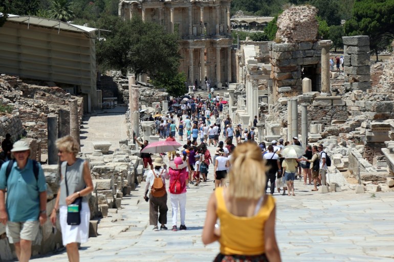 Tourists visit the ancient city of Ephesus near Izmir in the western Aegean region, Turkey August 5, 2018. Picture taken August 5, 2018. REUTERS/Sertac Kayar