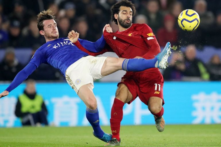 Soccer Football - Premier League - Leicester City v Liverpool - King Power Stadium, Leicester, Britain - December 26, 2019 Leicester City's Ben Chilwell in action with Liverpool's Mohamed Salah Action Images via Reuters/Carl Recine EDITORIAL USE ONLY. No use with unauthorized audio, video, data, fixture lists, club/league logos or