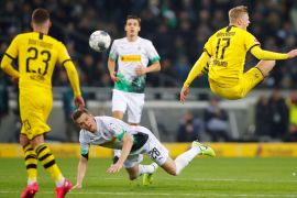 Soccer Football - Bundesliga - Borussia Moenchengladbach v Borussia Dortmund - Borussia-Park, Moenchengladbach, Germany - March 7, 2020 Borussia Moenchengladbach's Matthias Ginter in action with Borussia Dortmund's Erling Braut Haaland REUTERS/Wolfgang Rattay DFL regulations prohibit any use of photographs as image sequences and/or quasi-video