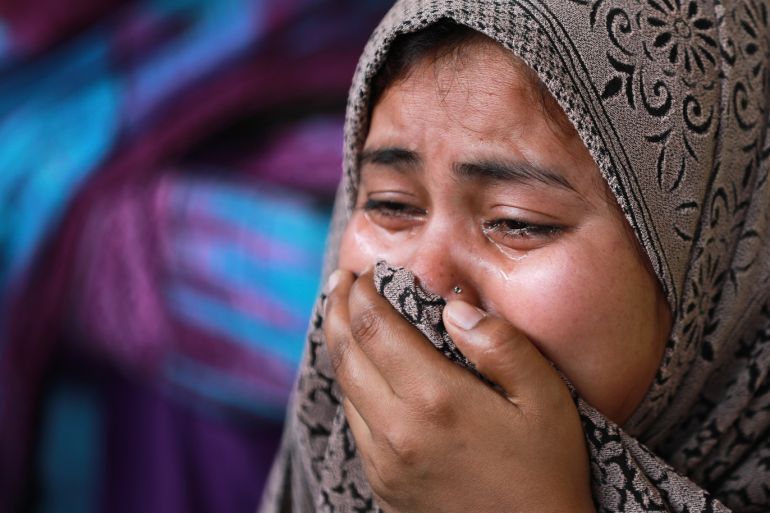Rukhsar, a Muslim woman who fled her home along with her family following Hindu-Muslim clashes triggered by a new citizenship law, reacts as she takes shelter in a relief camp in Mustafabad in the riot-affected northeast of New Delhi, India, March 3, 2020. Picture taken March 3, 2020. REUTERS/Anushree Fadnavis