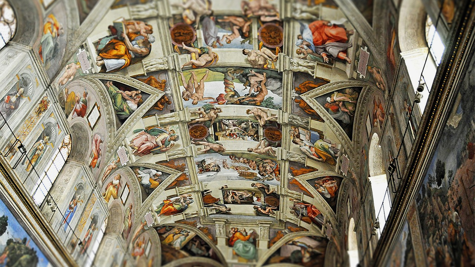 ‪‬ لوحة خلق آدم لمايكل آنجلو في سقف كنيسة سيستين الإيطالية(مواقع التواصل)