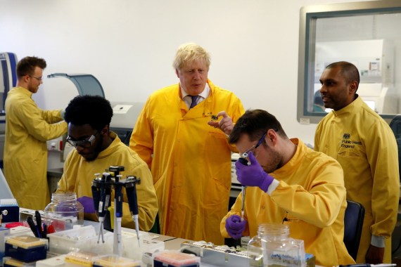Britain's Prime Minister Boris Johnson visits a laboratory at the Public Health England National Infection Service in Colindale, north London, Britain, March 1, 2020. REUTERS/Henry Nicholls TPX IMAGES OF THE DAY