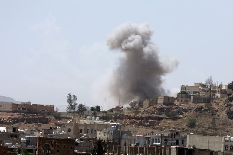 Dust rises from the site of a Saudi-led air strike in Sanaa, Yemen March 30, 2020. REUTERS/Khaled Abdullah