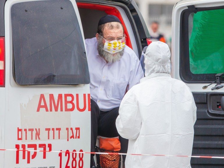 Coronavirus precautions in Israel- - TEL AVIV, ISRAEL - APRIL 3: A health officer checks a citizen in ambulance as a precaution against coronavirus (Covid-19) in Tel Aviv, Israel on April 3, 2020.