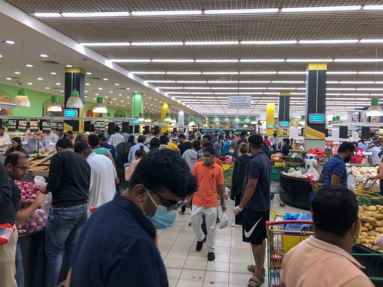 People shop at a supermarket, following the outbreak of the coronavirus disease (COVID-19), in Dubai, United Arab Emirates, March 26, 2020. REUTERS/Christopher Pike