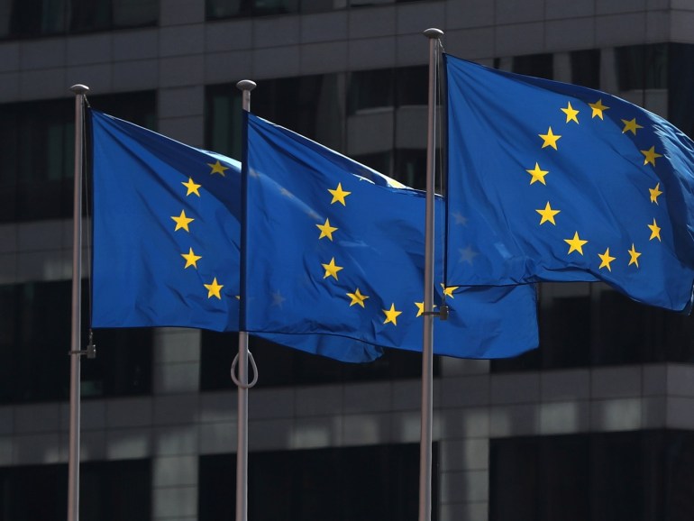 FILE PHOTO: European Union flags fly outside the European Commission headquarters in Brussels, Belgium, April 10, 2019. REUTERS/Yves Herman/File Photo