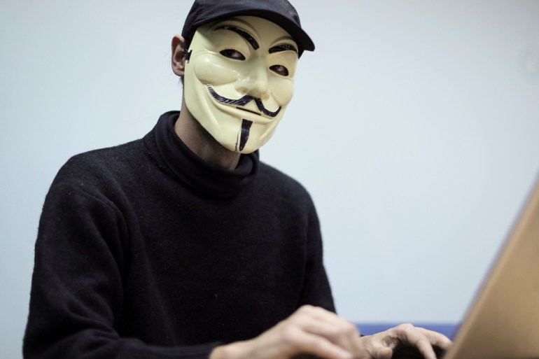 A hacker from Ukrainian ‘hactivist’ group RUH8 is seen during an interview with Reuters in Kiev, Ukraine, November 3, 2016. REUTERS/Gleb Garanich
