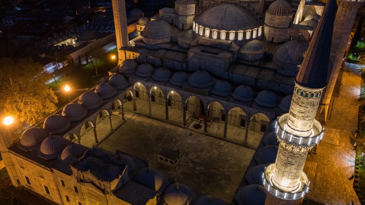 ISTANBUL, TURKEY - APRIL 24: In this aerial view from a drone, the closed Suleymaniye Mosque's courtyard is seen on the first day of the holy fasting month of Ramadan and the second day of a four-day lockdown across Istanbul on April 24, 2020, in Istanbul, Turkey. Turkey’s Mosques remain closed due to the spread of the COVID-19 virus as Muslims around the world began Ramadan, the holiest month of the Islamic calendar under lockdown. As of April 24, according to the Health Ministry, Turkey has 2,600 Coronavirus related deaths and confirmed cases have risen to 104,912. Despite the rising numbers Turkey has avoided a full lockdown and continues to implement short lockdowns and constant revisions of current restrictions. The interior ministry continues restrictions on travel between 31 cities, a curfew continues to be in place for anyone over the age of 65 and under 20, schools, cafes, bars and non-essential businesses remain closed. (Photo by Burak Kara/Getty Images)