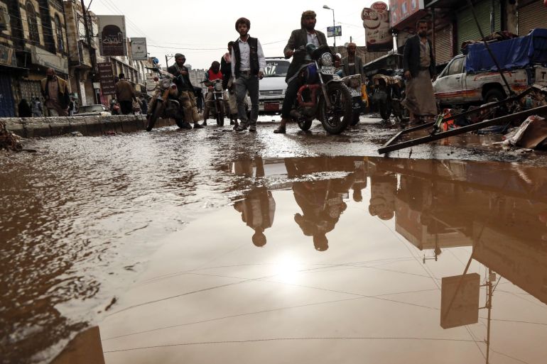 Heavy rainfall in Yemen- - SANAA, YEMEN - APRIL 14: People inspect the damaged sites after the area has been flooded due to heavy rains in Sanaa, Yemen on April 14, 2020.