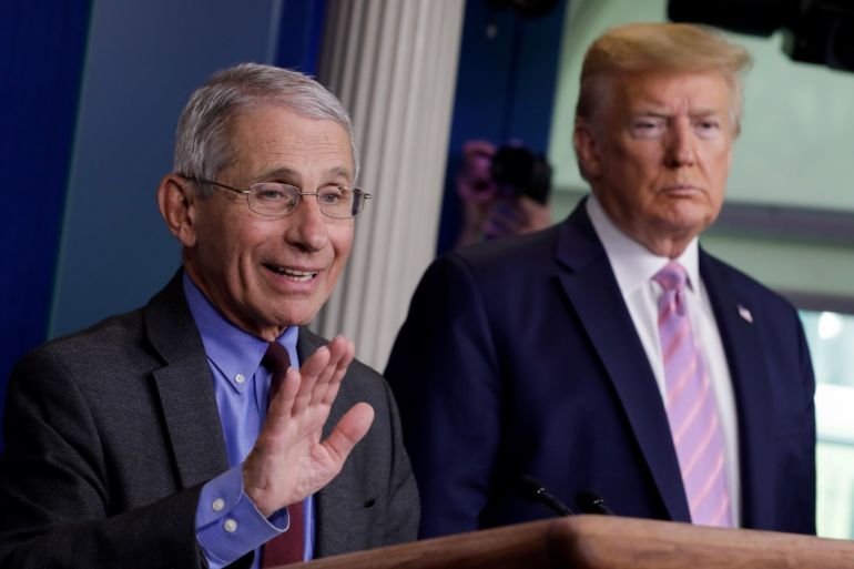 National Institute of Allergy and Infectious Diseases director Dr. Anthony Fauci speaks as U.S. President Donald Trump listens during the coronavirus response daily briefing at the White House in Washington, U.S., April 10, 2020. REUTERS/Yuri Gripas