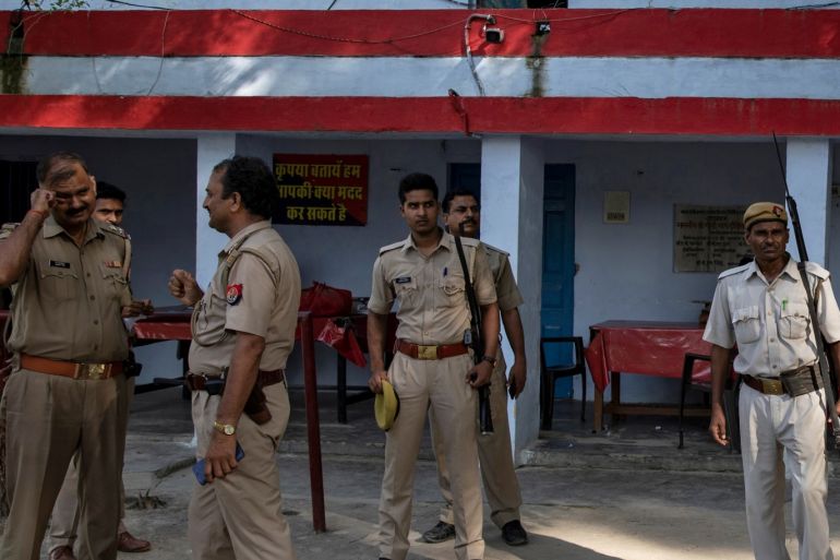 REFILE - CORRECTING CAPTION INFORMATION Policemen stand inside Makhi police station where the father of the woman who is fighting a rape case against a legislator of the ruling Bharatiya Janata Party (BJP) died in police custody, in Unnao, in the northern state of Uttar Pradesh, India, July 31, 2019. Picture taken July 31, 2019. REUTERS/Danish Siddiqui TPX IMAGES OF THE DAY