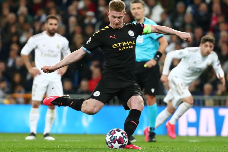 Soccer Football - Champions League - Round of 16 First Leg - Real Madrid v Manchester City - Santiago Bernabeu, Madrid, Spain - February 26, 2020 Manchester City's Kevin De Bruyne scores their second goal from the penalty spot REUTERS/Sergio Perez