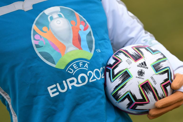 UEFA Euro 2020 mascot Skillzy poses for a photo with the official match ball at Olympiapark in Munich, Germany, March 3, 2020. REUTERS/Andreas Gebert