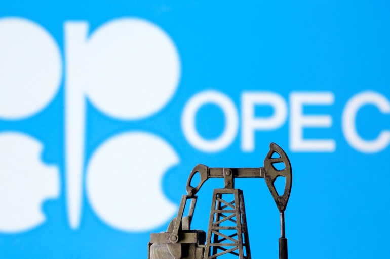 A 3D printed oil pump jack is seen in front of displayed Opec logo in this illustration picture, April 14, 2020. REUTERS/Dado Ruvic/Illustration