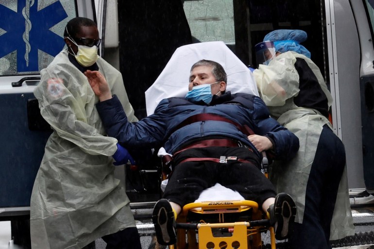 A patient is transported at the emergency entrance outside Mount Sinai Hospital in Manhattan during the outbreak of the coronavirus disease (COVID-19) in New York City, New York, U.S., April 13, 2020. REUTERS/Mike Segar TPX IMAGES OF THE DAY
