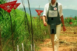 Diana, Princess of Wales walking in one of the safety corridors of the land mine fields of Huambo