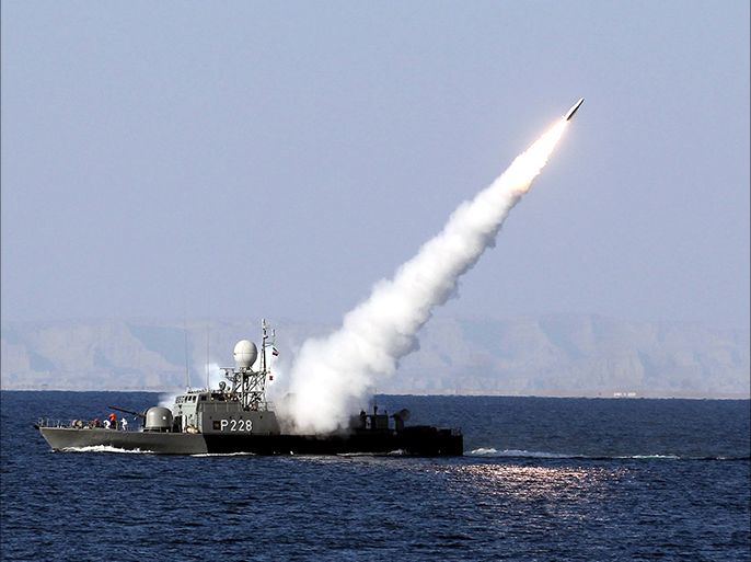 epa03046931 An Iranian navy warship test fires a new long range missile (Mehrab) during the Iranian navy military exercise on the Sea of Oman, near the Strait of Hormuz in southern Iran, 01 January 2012. Amid a verbal row with the United States over blocking the Strait of Hormuz, a vital oil shipping route, Iran on Saturday started testing long range missiles in the Persian Gulf. Fars news agency reported that on the final phase of navy maneuvers in the Persian Gulf, several long-range missiles were tested. The maneuver has been overshadowed by a verbal row between Iran and the US over an Iranian threat to close the Strait of Hormuz in the Persian Gulf, through which 40 per cent of the world?s ship-borne crude is passed. EPA/EBRAHIM NOROOZI