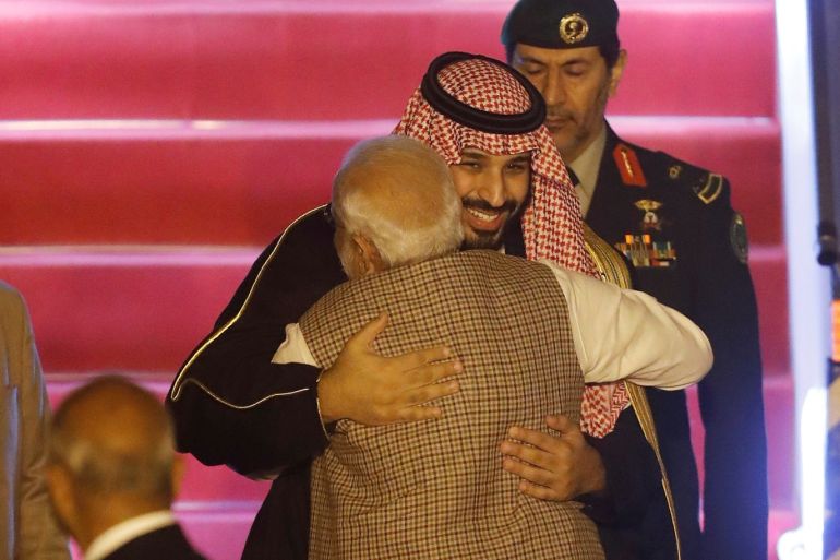 Saudi Arabia's Crown Prince Mohammed bin Salman hugs India’s Prime Minister Narendra Modi upon his arrival at an airport in New Delhi, India, February 19, 2019. REUTERS/Adnan Abidi