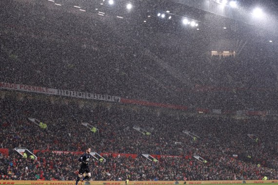 Soccer Football - Premier League - Manchester United vs AFC Bournemouth - Old Trafford, Manchester, Britain - December 13, 2017 General view during the match while it is raining REUTERS/Darren Staples EDITORIAL USE ONLY. No use with unauthorized audio, video, data, fixture lists, club/league logos or