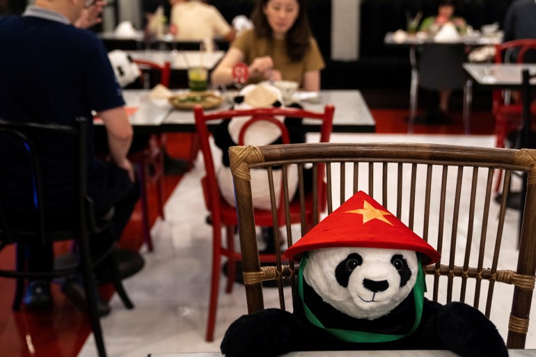 The spread of the coronavirus disease (COVID-19) in Bangkok People have dinner as they sit next to stuffed panda dolls, used as part of social distancing measures to prevent the spread of the coronavirus disease (COVID-19), at the Maison Saigon restaurant that reopened after the easing of restrictions in Bangkok, Thailand, May 13, 2020. Picture taken May 13, 2020. REUTERS/Athit Perawongmetha TPX IMAGES OF THE DAY