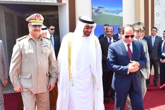 Egyptian President Abdel Fattah al-Sisi (R) arrives with Arab leaders Sheikh Mohammed bin Zayed (C), Crown Prince of Abu Dhabi, and General Khalifa Haftar (L), commander in the Libyan National Army and members of the Egyptian military at the opening of the Mohamed Najib military base, the graduation of new graduates from military colleges, and the celebration of the 65th anniversary of the July 23 revolution at El Hammam City in the North Coast, in Marsa Matrouh, Egypt, July 22, 2017 in this handout picture courtesy of the Egyptian Presidency. The Egyptian Presidency/Handout via REUTERS ATTENTION EDITORS - THIS IMAGE WAS PROVIDED BY A THIRD PARTY عبد الفتاح السيسي ومحمد بن زايد وخليفة حفتر
