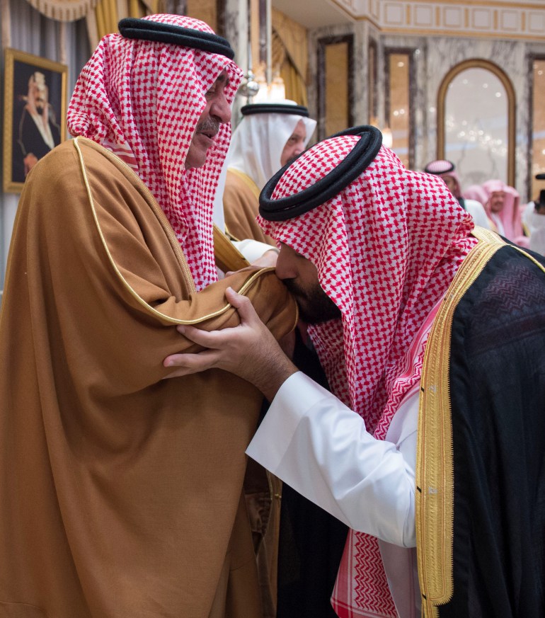 Saudi Arabia's Crown Prince Mohammed bin Salman kisses the hand of former crown prince Muqrin bin Abdulaziz during an allegiance pledging ceremony in Mecca, Saudi Arabia