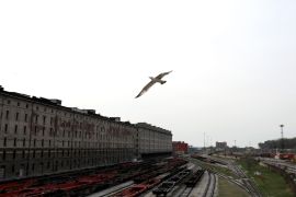 TRIESTE, ITALY - APRIL 2: A seagull flies over the train trucks of the internal railway system of the port at Trieste's new Port on April 2, 2019 in Trieste, Italy. The historic city of Trieste is preparing to open its new port to China, with Italy becoming the first Group-of-Seven nation to sign on to China’s “One Belt, One Road” infrastructure project. The deal primes Trieste to receive investment from China as it eyes a faster trade route into the heart of Europe. Among the qualities that make Trieste a desirable port of call: 70km of internal railways that are integrated with national and international networks; an elevated roadway that directly connects to the external road system; and deep sea beds up to 18 meters. China sees Trieste as a natural crossroads between the East and the West, a shipping route between Europe and East Asia that is four days shorter than routes to the ports in Northern Europe. For a line of 6,000 TEU container vessels, this translates into an economic saving on freight and fuel costs of over $25 million a year, according to Trieste’s port authority. (Photo by Marco Di Lauro/Getty Images)