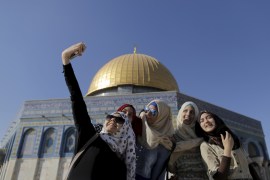 Palestinian Sanaa Abu Jaudi (L), 16, from the West Bank city of Jenin, takes a selfie photo with friends in front of the Dome of the Rock on the compound known to Muslims as Noble Sanctuary and to Jews as Temple Mount, in Jerusalem's Old City, during the holy month of Ramadan, June 29, 2015. This is Abu Jaudi's third visit to the compound. Palestinians young and old have jumped on a trend for taking
