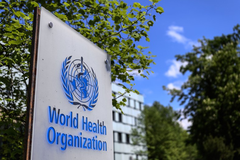 This picture taken on April 24, 2020 shows a sign of the World Health Organization (WHO) in Geneva next to their headquarters, amid the COVID-19 outbreak, caused by the novel coronavirus. (Photo by Fabrice COFFRINI / AFP)