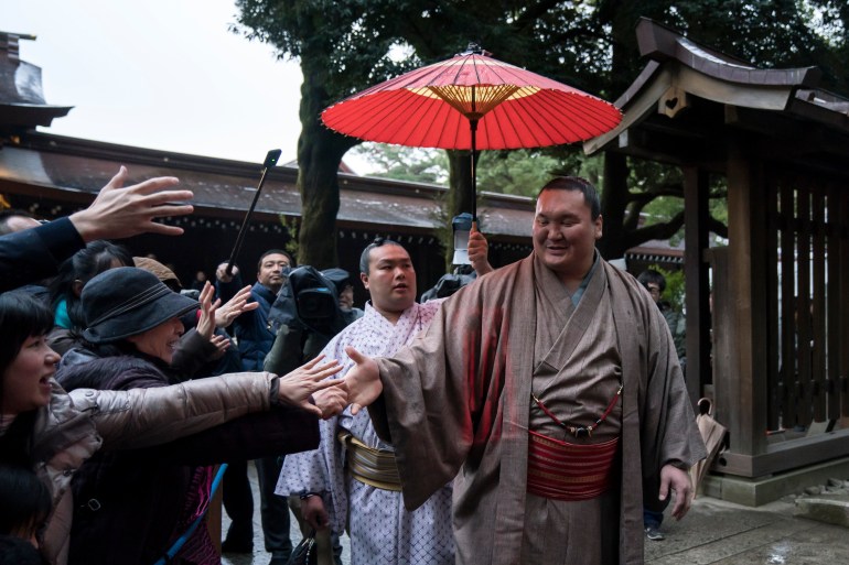 Sumo Wrestlers Celebrate New Year In Tokyo